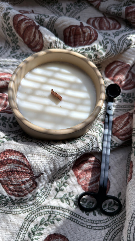 Handmade pear, patchouli and black rum soy candle with wooden wick in reusable cream concrete vessel