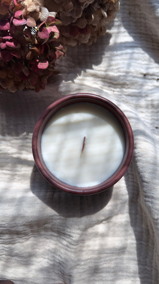 Grapefruit and vetiver soy candle with wooden wick in wine concrete vessel