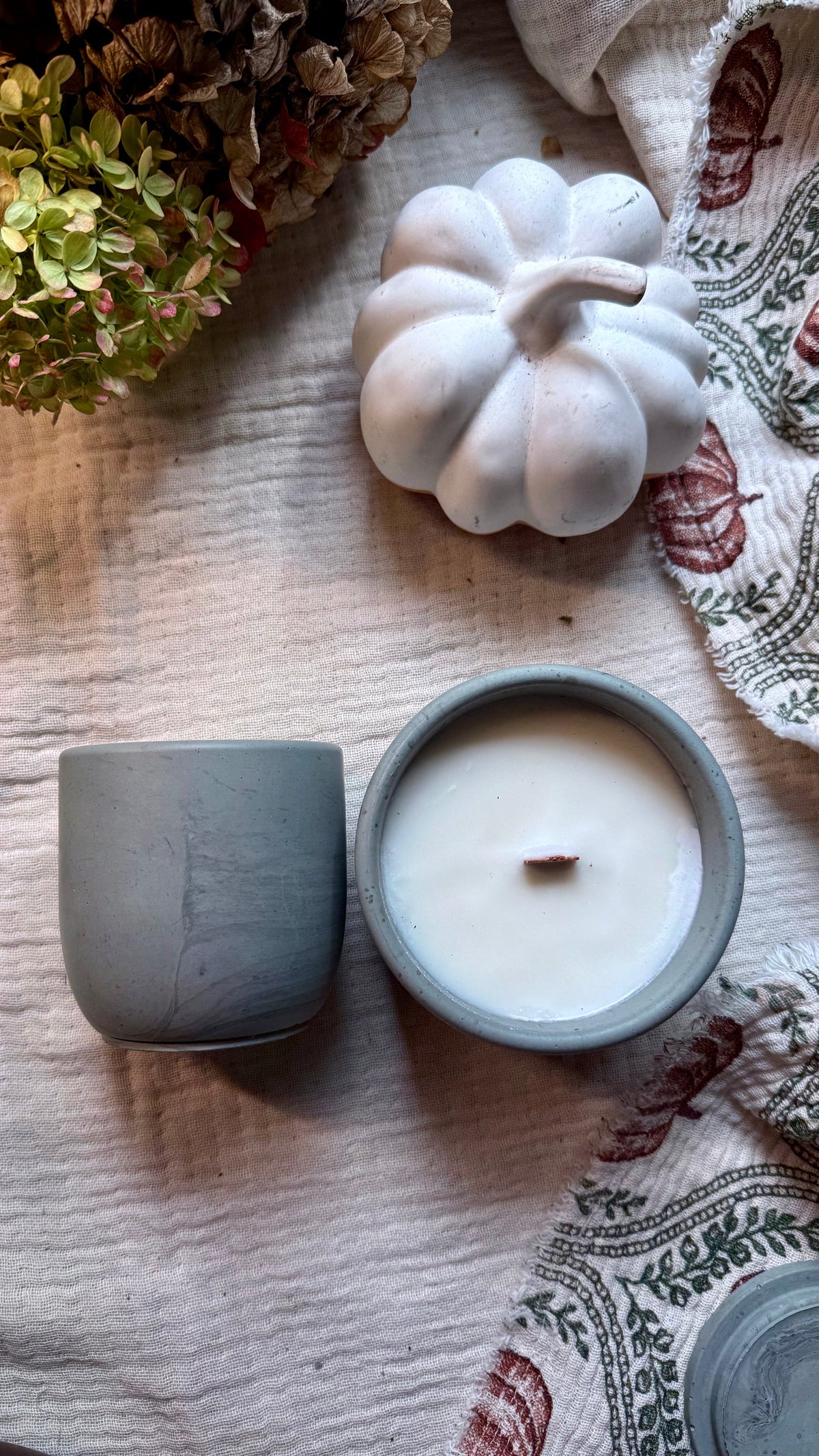 Handmade apple, peach and moss soy candle with wooden wick in reusable slate concrete vessel